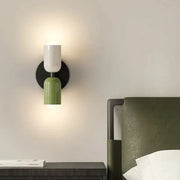 Modern white and olive green macaron wall lamp with a two-tone design mounted on black base for bedroom decorbites cream 2head