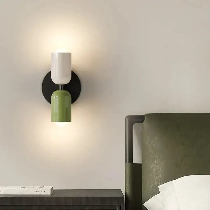 Modern white and olive green macaron wall lamp with a two-tone design mounted on black base for bedroom decorbites cream 2head