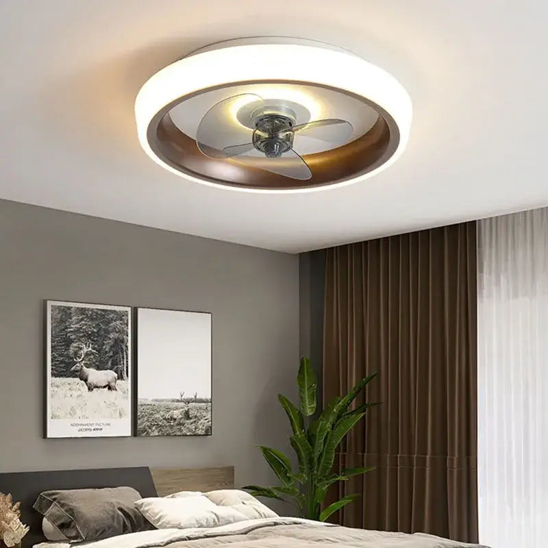 Modern white and orange circular ceiling fan light with integrated led lighting and bronze frame for bedroom use