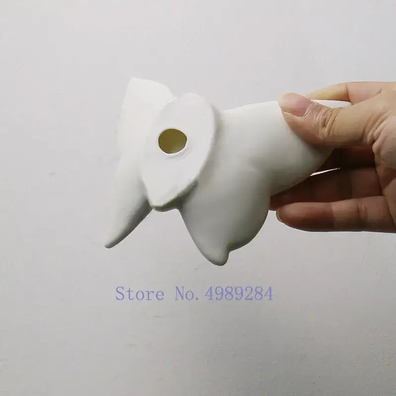 Modern white ceramic stylized animal figurine with pointed ears and hole head for decorbites butterfly wall mount decor