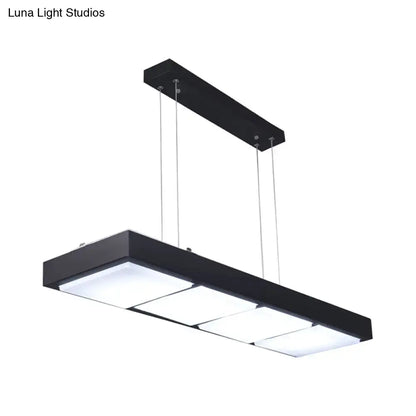 Black metal DecorBites™ rectangular island lamp with four illuminated square panels for modern office lighting