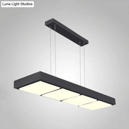 Black metal rectangular island lamp with three illuminated panels ideal for office hanging lighting by DecorBites