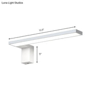 Modern white rectangular led wall lamp with sleek design emitting warm white light ideal for bedroom use