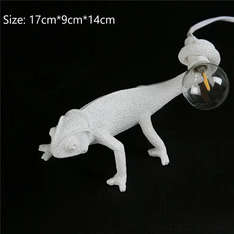 Modern white resin chameleon led table lamp with textured design and clear bulb tail for bedroom reading decorbites chameleon led