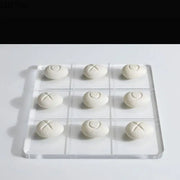 Modern white resin pieces acrylic tic-tac-toe set with textured egg-shaped o and x markers for living room decorbites decor