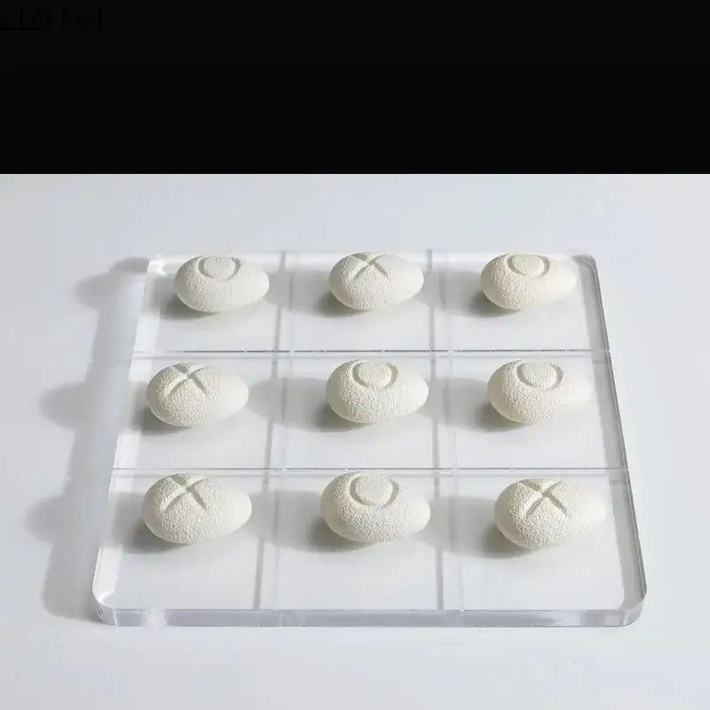 Modern white resin pieces acrylic tic-tac-toe set with textured egg-shaped o and x markers for living room decorbites decor