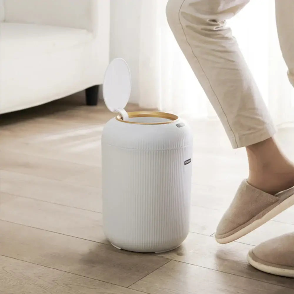 Modern white ribbed 10l luxury sensor trash can with gold rim and vertical texture for kitchen decorbites 10l luxury decor