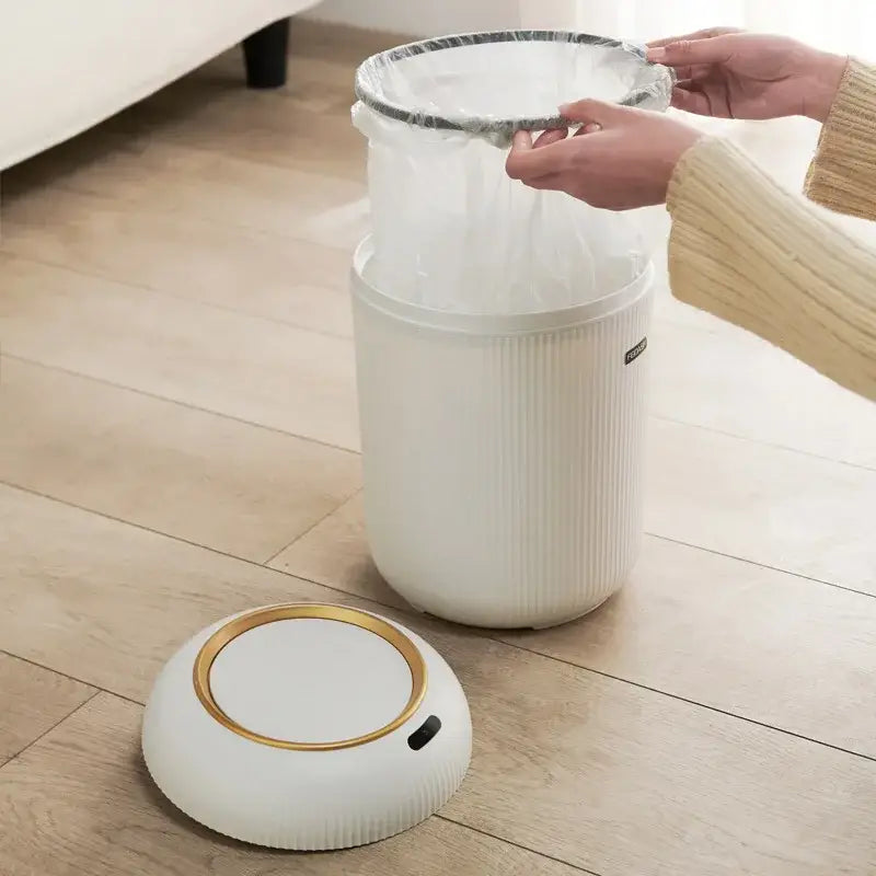 Modern white ribbed 10l luxury sensor trash can with gold-accented lid and vertical texture for stylish kitchen decorbites use