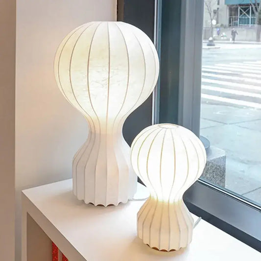 Modern white ribbed silk cocoon silk table lamp with sculptural design for bedroom decorbites gatto cocoon style