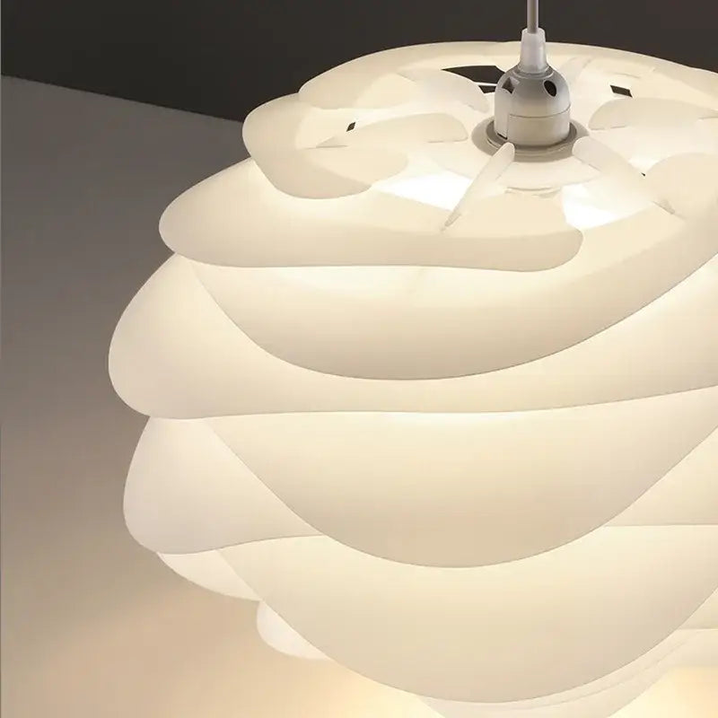 Modern white rose flower pendant lights with smooth translucent layered petals by decorbites carmina rose for bedroom decor