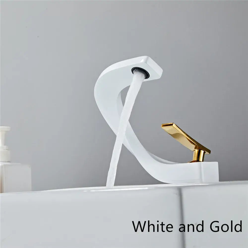 Modern white and rose gold basin faucet with elegant rose gold finish and sleek curved waterfall design for bathroom use