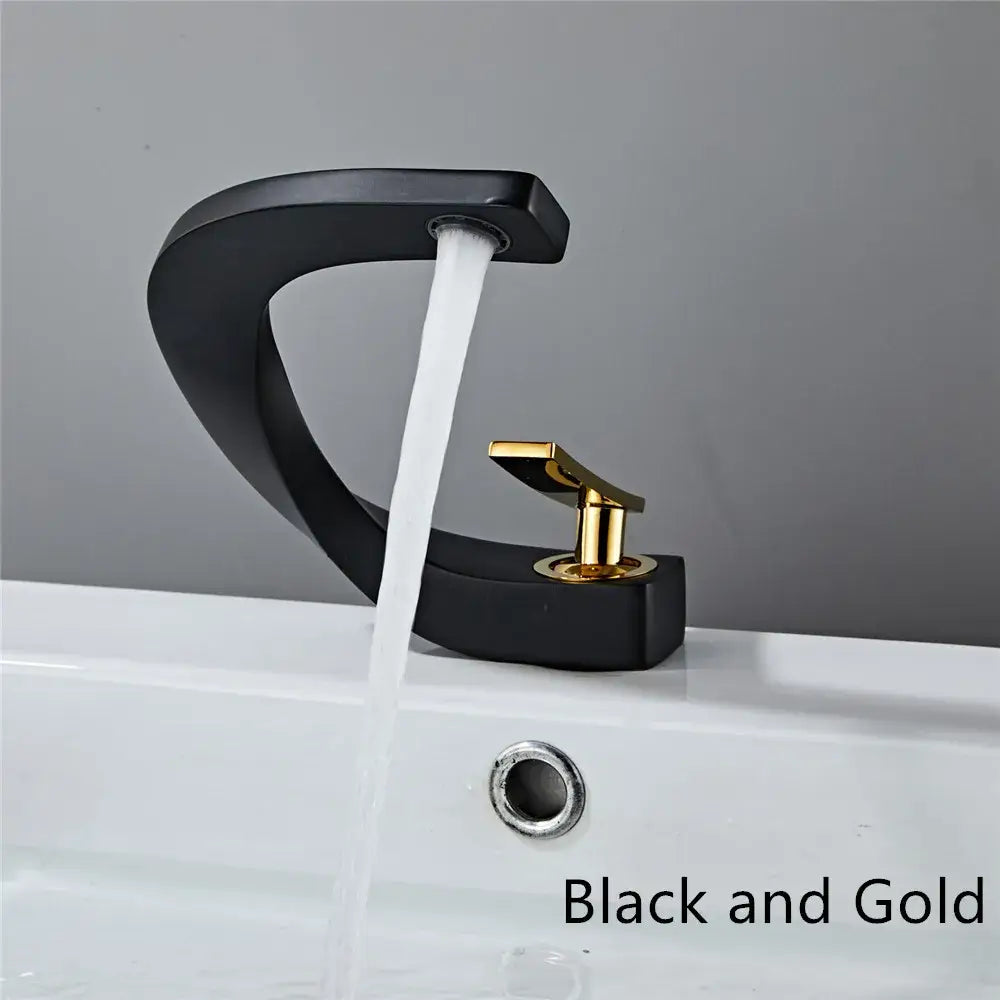 Modern white and rose gold basin faucet with elegant rose gold finish and sleek black and gold waterfall design