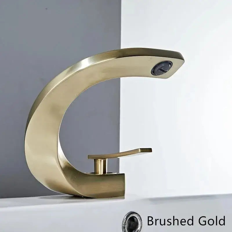 Modern white and rose gold basin faucet with brushed gold finish and sleek curved design for elegant bathroom use