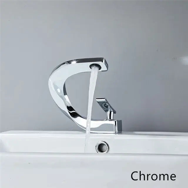 Modern white and rose gold basin faucet with chrome finish sleek curved design and single lever handle for bathroom use
