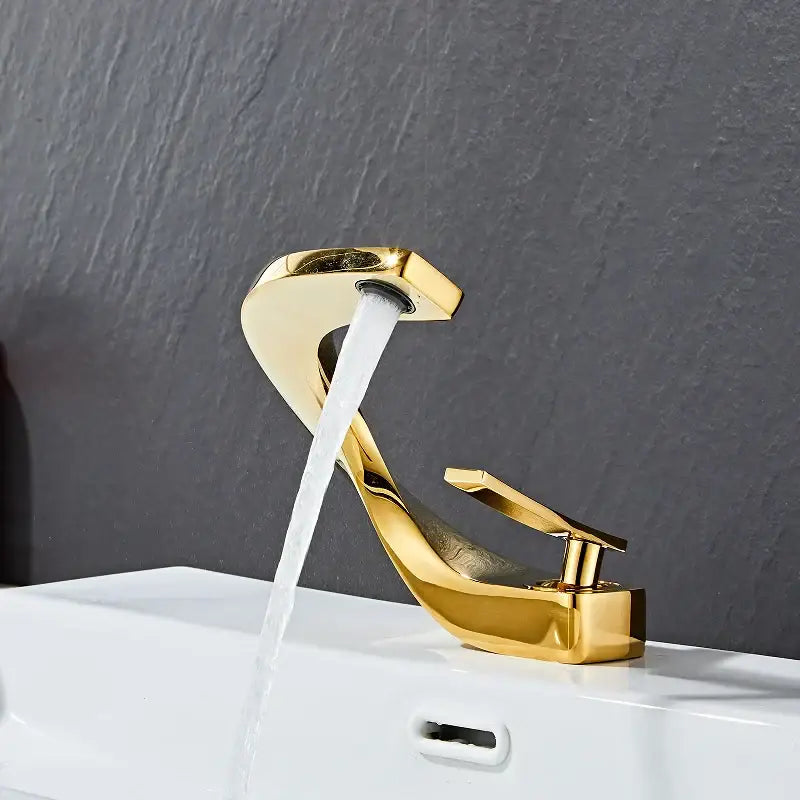 Modern white basin faucet with elegant rose gold finish and sleek curved waterfall spout design for bathroom use