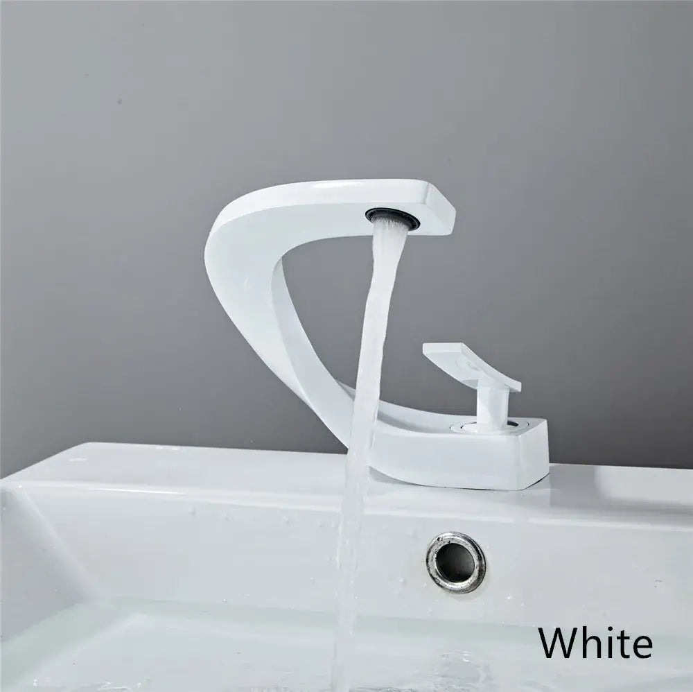 Modern white basin faucet with sleek curved design and elegant rose gold finish for bathroom waterfall tap