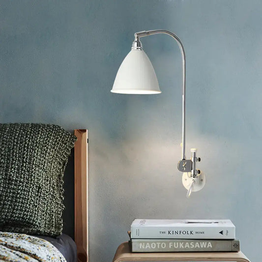 Modern white sconce wall lamp with curved chrome arm and white metal shade for bedroom wall lighting