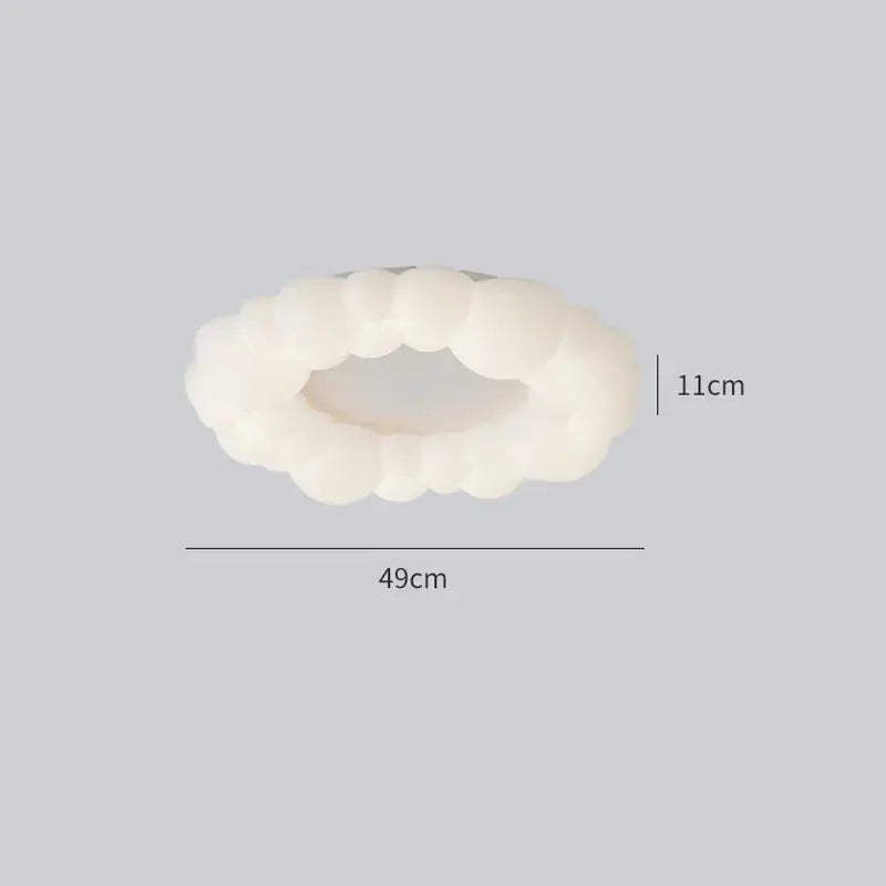 Off-white cloud living room ceiling lamp with soft rounded texture and sculptural design measuring 49cm by 11cm