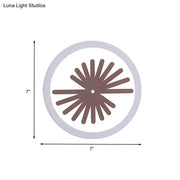 Modern white sector leaf pattern wall light with a circular white clock face and brown radial spokes for living room sconce