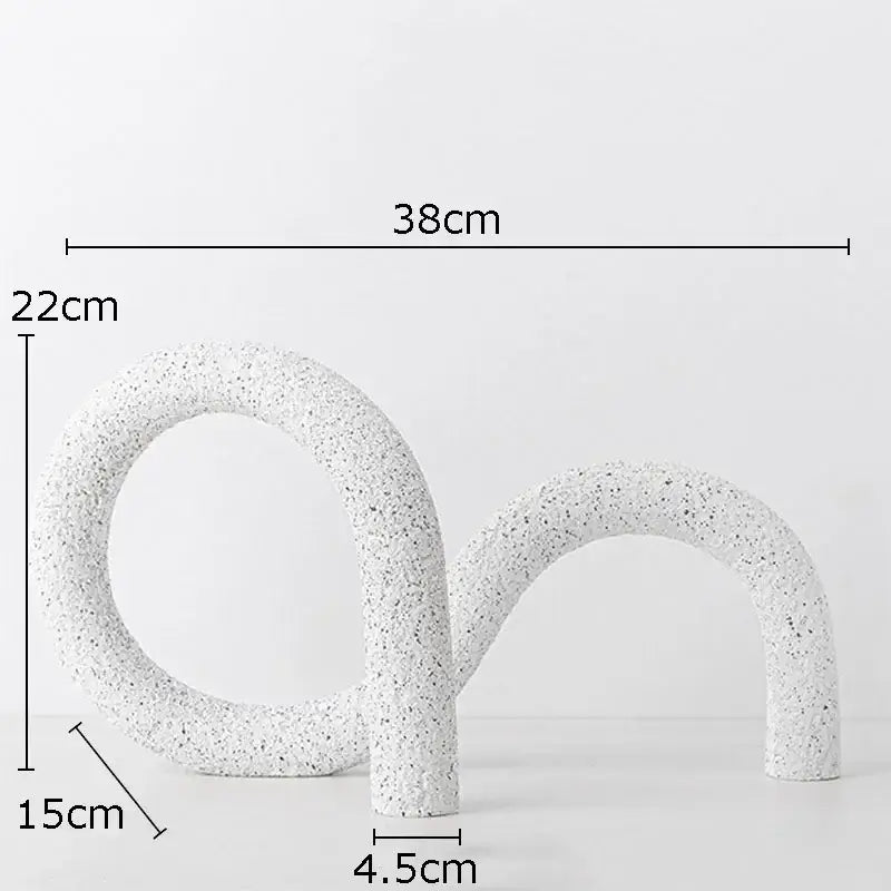 Modern white speckled resin abstract twisted knot sculpture with s-shaped design for living room decor