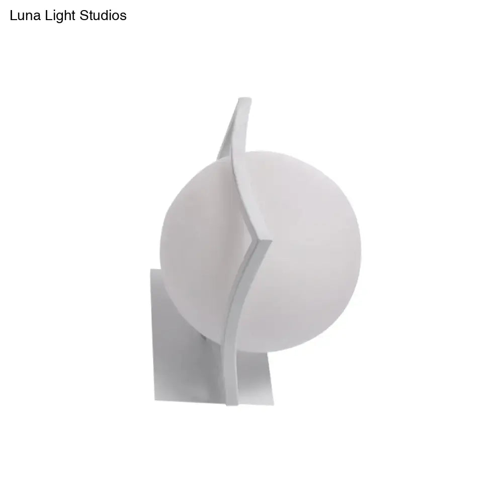 Modern white sphere opal glass wall sconce with sleek angular arms direct wired electric kitchen light