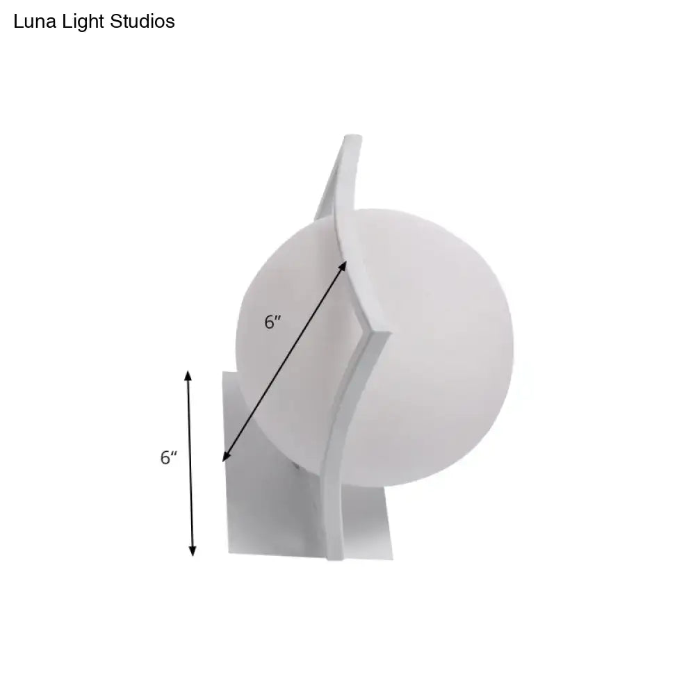 Modern white sphere opal glass wall sconce with direct wired electric connection and minimalist sculptural base