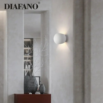 Modern white spherical gypsum led wall lamp with matte finish and diafano logo for bedroom sconce lighting