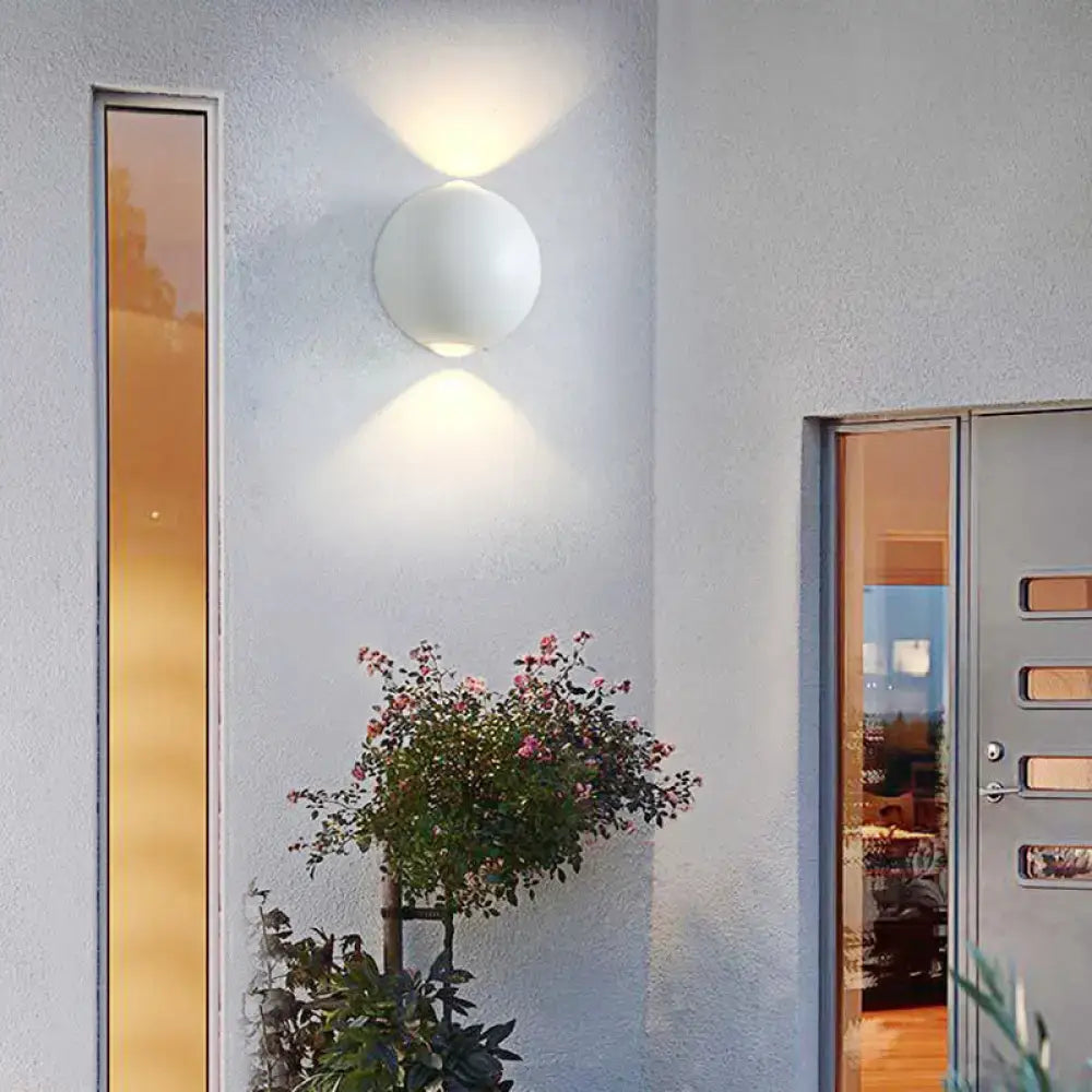 Modern white spherical outdoor wall light fixture with smooth matte finish wall light for exterior use
