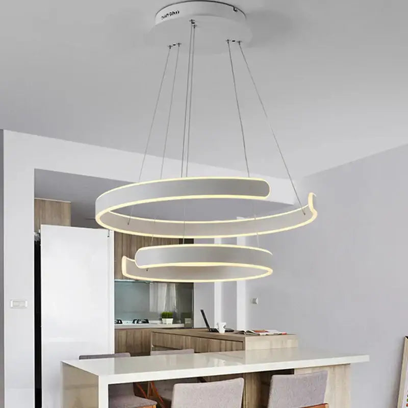 Modern white spiral pendant light with glowing circle rings ideal for dining room decorbites geometry circle design