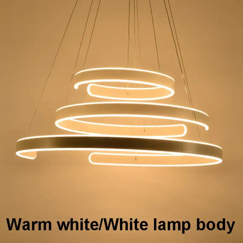 Modern white spiral pendant light with warm white led circle rings for dining room decorbites geometry circle design