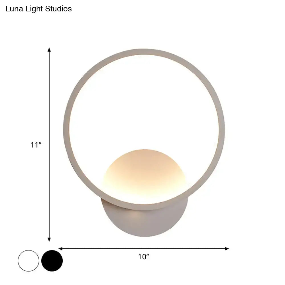 Modern white square bedside wall lamp with a sleek circular frame and warm glowing spherical light for minimalist lighting