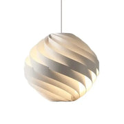 A modern white swirling spherical pendant light made of matte material ideal for dining room decorbites designer pendant