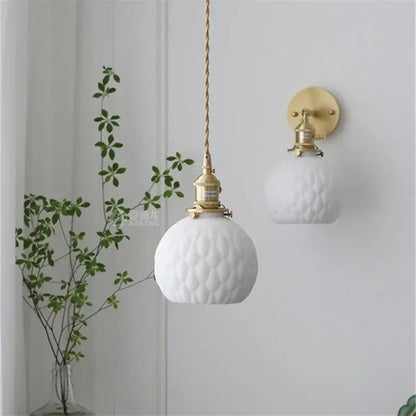 Modern white textured glass ceramic led pendant light with gold hardware and twisted cord for kitchen pendant lights decorbites ceramic led