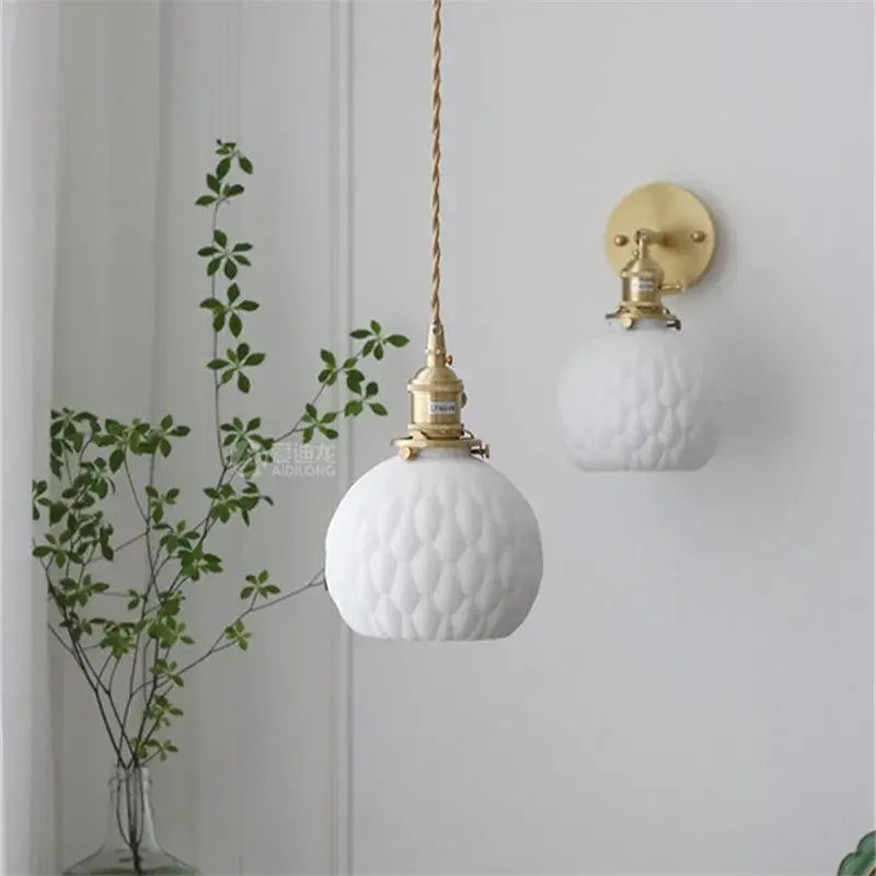 Modern white textured glass ceramic led pendant light with gold hardware and twisted cord for kitchen pendant lights decorbites ceramic led