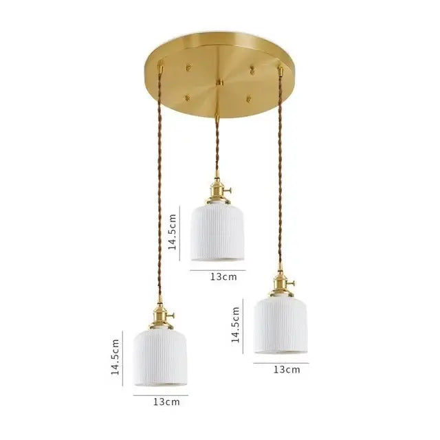Modern white textured glass ceramic led pendant light with gold-toned fixture and three white ribbed glass shades by decorbites ceramic led