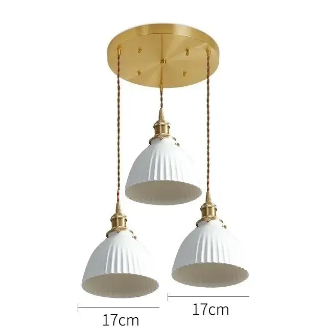 Modern white ribbed ceramic led pendant lights with brass accents and twisted chain suspension for kitchen decorbites ceramic led