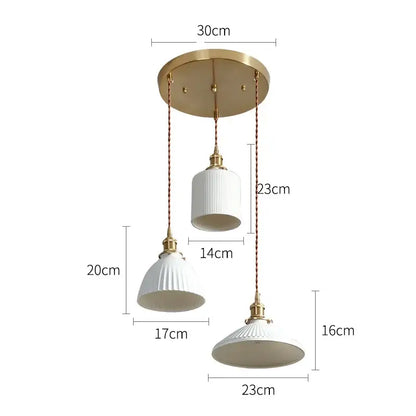 Modern white textured glass ceramic led pendant lights with brass accents by decorbites for kitchen decor