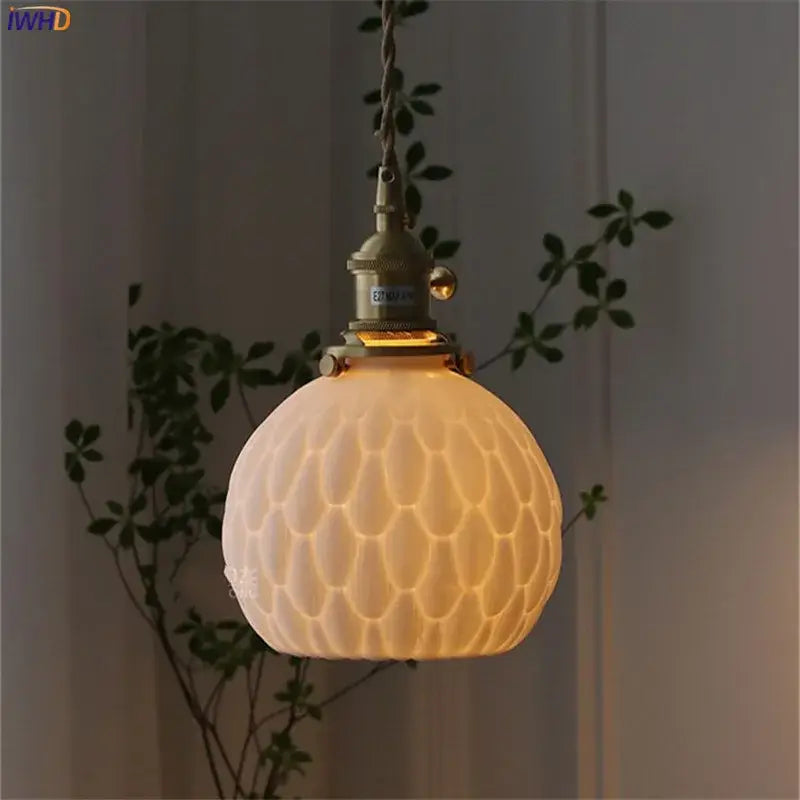Modern white textured glass ceramic led pendant light with cream honeycomb pattern and brass hardware for kitchen decorbites ceramic led