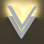 Modern white v-shaped led wall mounted light with warm led lighting ideal for bedroom wall mounted light decor