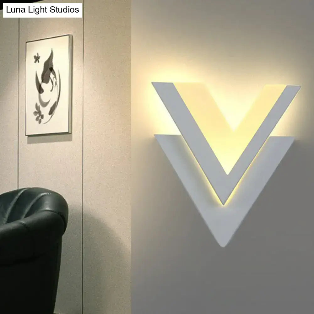 Modern white v-shaped led wall mounted light with warm glowing edges for bedroom wall mounted light decor