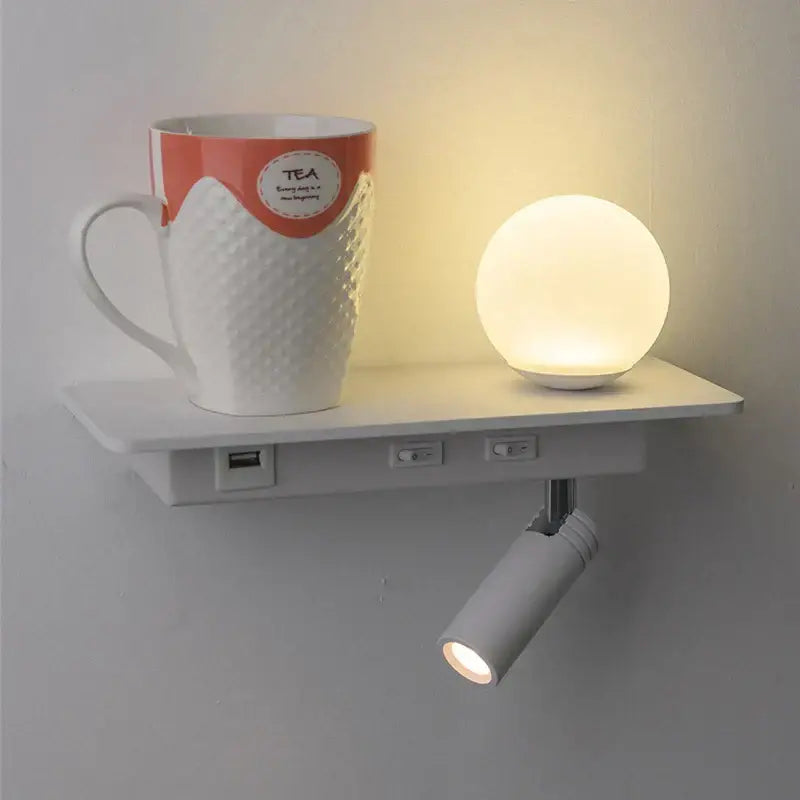 Modern white wall lamp with usb charging featuring a white ceramic mug with orange band and tea label decorbites led bedside
