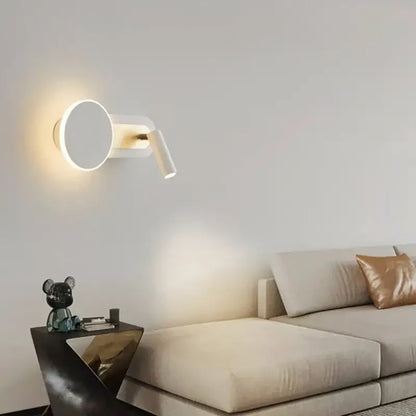Modern white wall light with adjustable spotlight and circular base for living room decor featuring led wall light design
