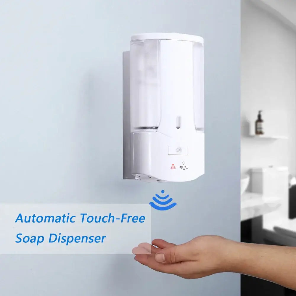 Modern white wall mounted automatic liquid soap dispenser with clear reservoir and sensor for touch-free dispensing