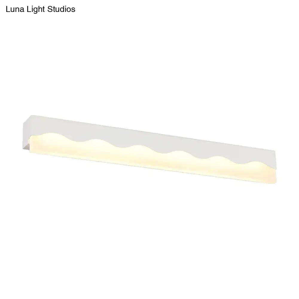 Modern white wave led vanity light fixture with sleek wavy design and warm glow as an elegant led vanity light