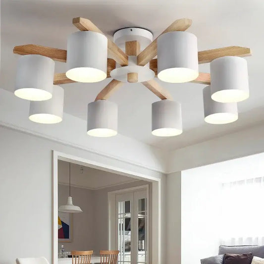 Modern white wood chandelier with six white cylindrical shades and natural wood arms lighting fixture for kitchen island decorbites iron