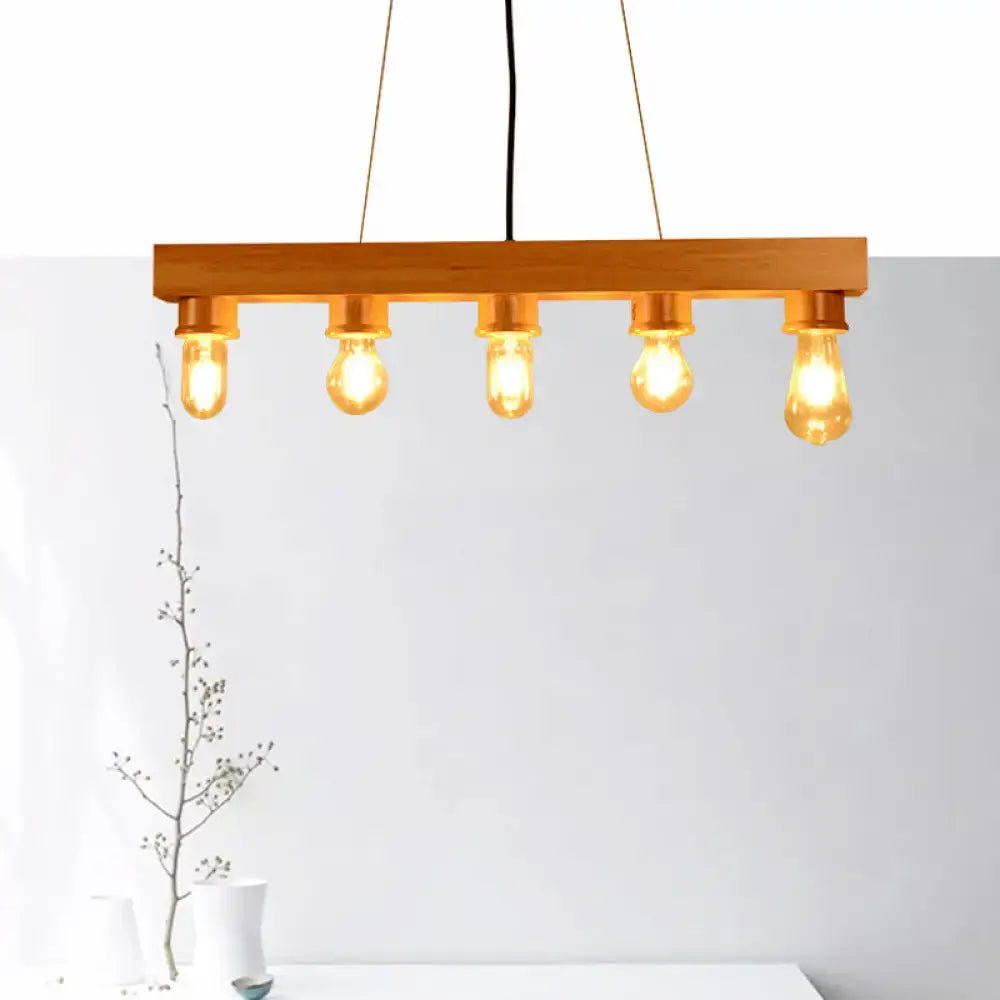 Warm-toned wooden rectangular chandelier with five exposed edison bulbs for dining room ceiling light use