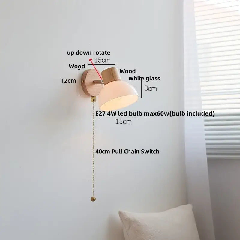 Modern wood and amber glass led wall sconce with natural wood base white glass shade and brass pull chain switch decorbites amber glass