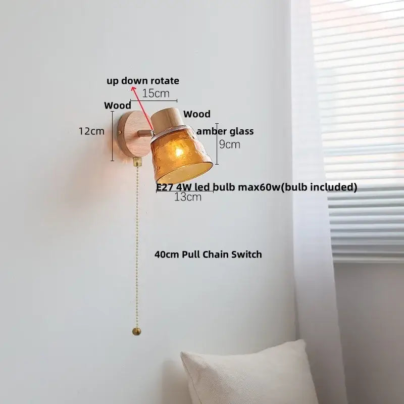 Modern wood and amber glass led wall sconce with warm amber glass and wooden base featuring 40cm pull chain switch