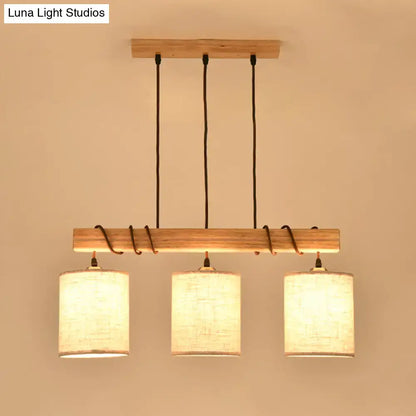 Modern wood and beige fabric island lighting fixture with warm-toned wooden pendant and linen shades for dining room 220v-240v