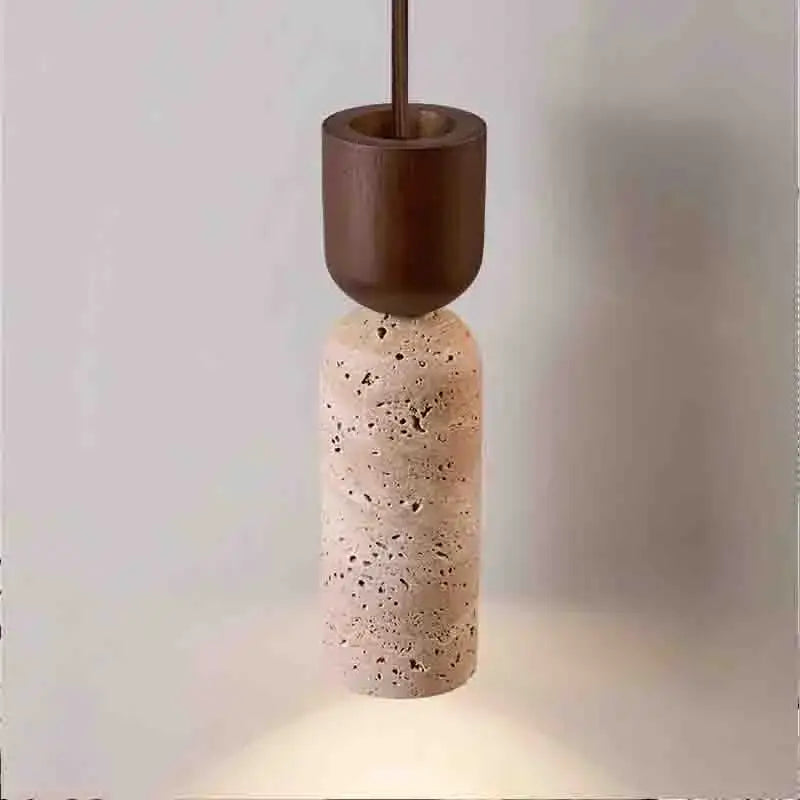 Minimalist pendant light with dark wood top and beige textured stone cylinder for modern kitchen decor cord pendant installation